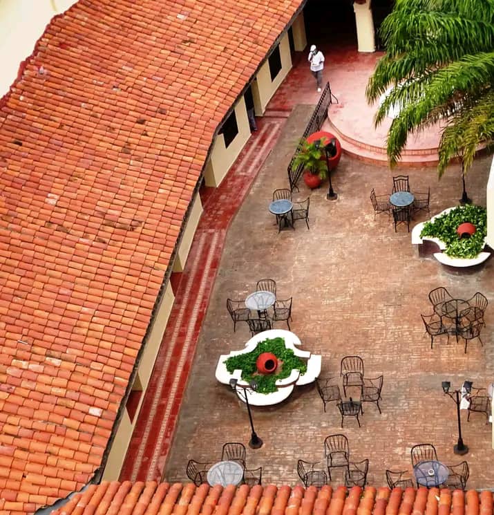 Clay tinajones in a courtyard